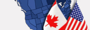 North American provinces and states highlighted in blue and a Canadian and American flag