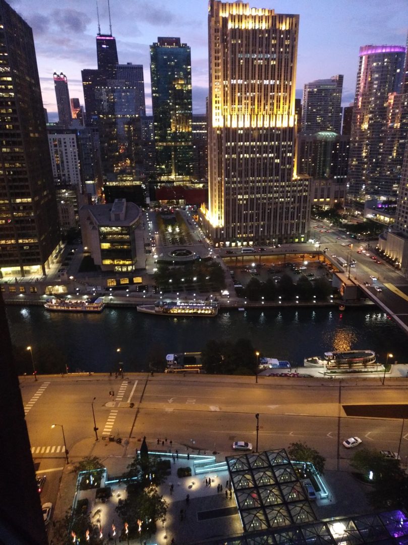 View of downtown city lights looking over a canal